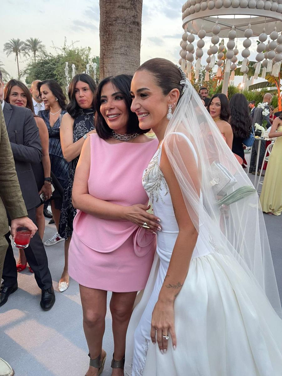 أمينة خليل - حفل زفاف أمينة خليل - أحمد زعتر - فستان زفاف أبيض - فستان ميزون يحيى - جلسة تصوير الزفاف - Vogue Arabia - منى زكي - يسرا - هالة صدقي - أحمد حلمي - لبلبة - جميلة عوض - تامر حبيب - كندة علوش - عمرو يوسف - لميس الحديدي - علي البيلي - صور زفاف النجوم - فستان عروس عصري - تصميم ياسمين يحيى - نخيل - زفاف المشاهير مصر 2025