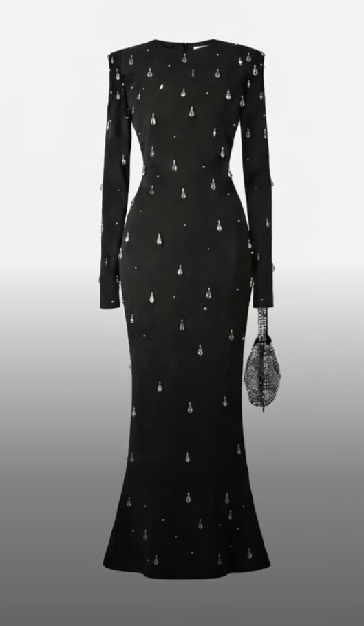 دينا الشربيني بفستان ساره أنسي