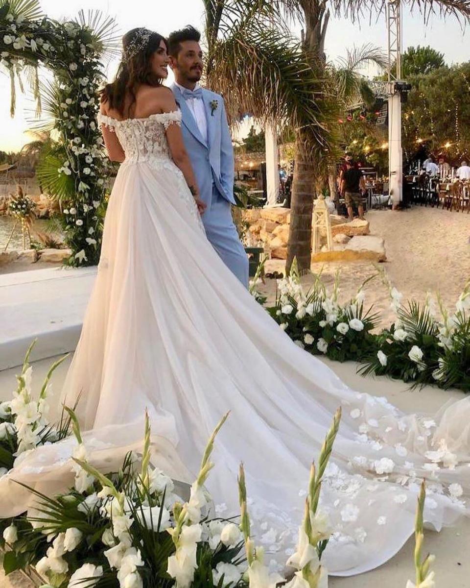 صور متداولة من زفاف دينيز بايسال و باريش يورتشوا