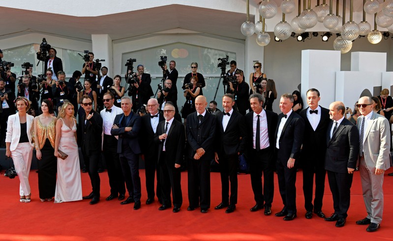 oann - Director Paolo Sorrentino poses with cast members Jude Law, John Malkovich, Javier Camara, Cecile de France, Ludivine Sagnier, Yulia Snigir and others