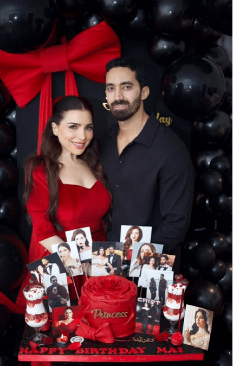 مي عز الدين وزوجها