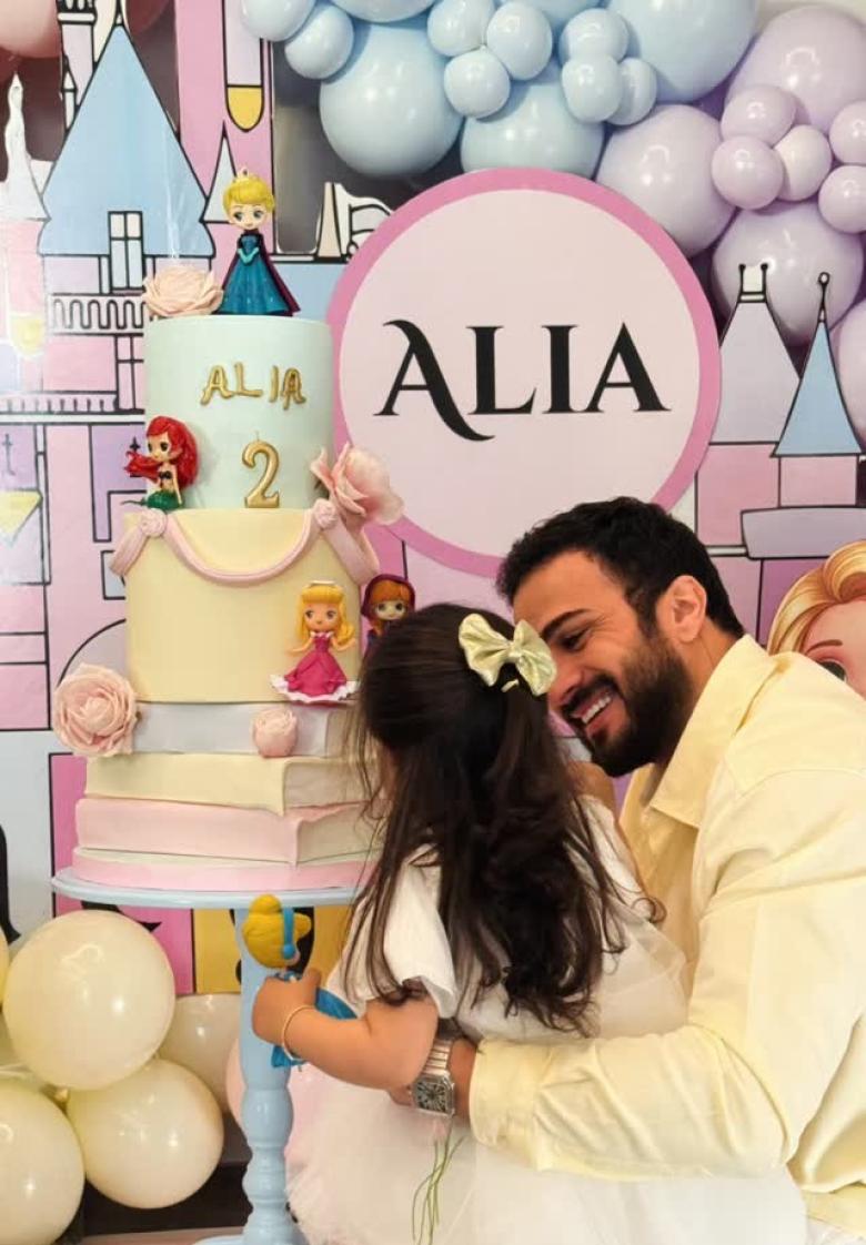 ألكسندر علوم  و ابنته عليا