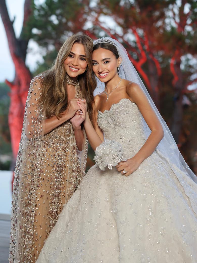 جوليا بطرس ولانا نصولي بإطلالات من إيلي صعب في زفاف سامر بو صعب - الصورة بعدسة باتريك صوايا ومن انستغرام بسام فتوح 