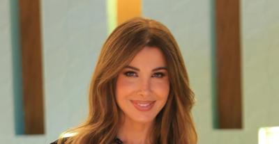 نانسي عجرم بالبودي والـ Skort من Self-Portrait وحزام Dior