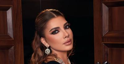 أصالة بفستان أسود بتطريزات ذهبية من توقيع مهرة للمصممة فرح البابطين - الصورة بعدسة محمد أحمد