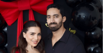 مي عز الدين وزوجها