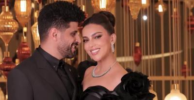 حمدي الميرغني وإسراء عبدالفتاح 