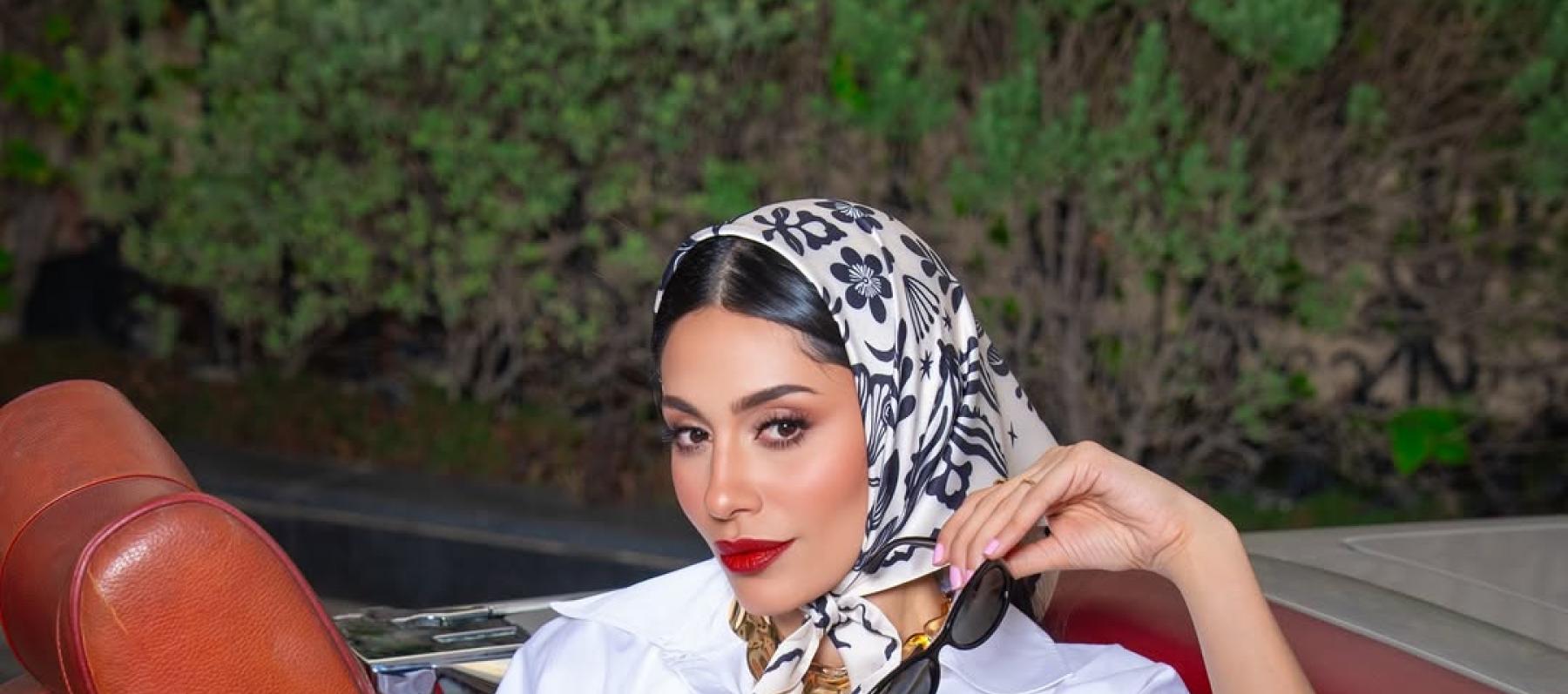إلهام علي تعيد أسلوب الريترو بالفستان القميص والوشاح