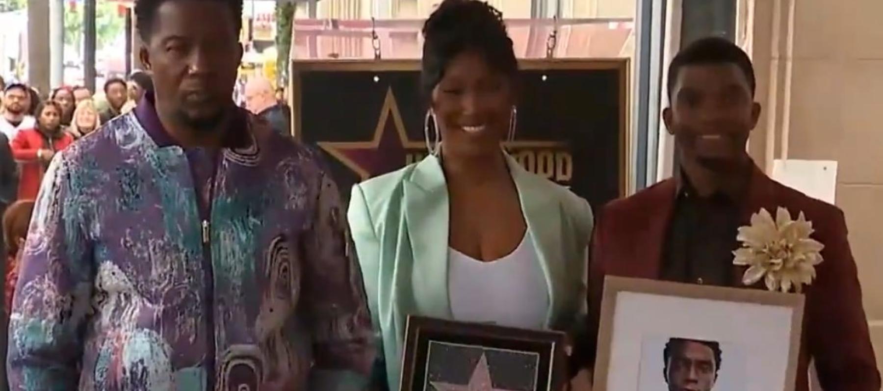 زوجة شادويك بوسمان مع شقيقيه - إكس