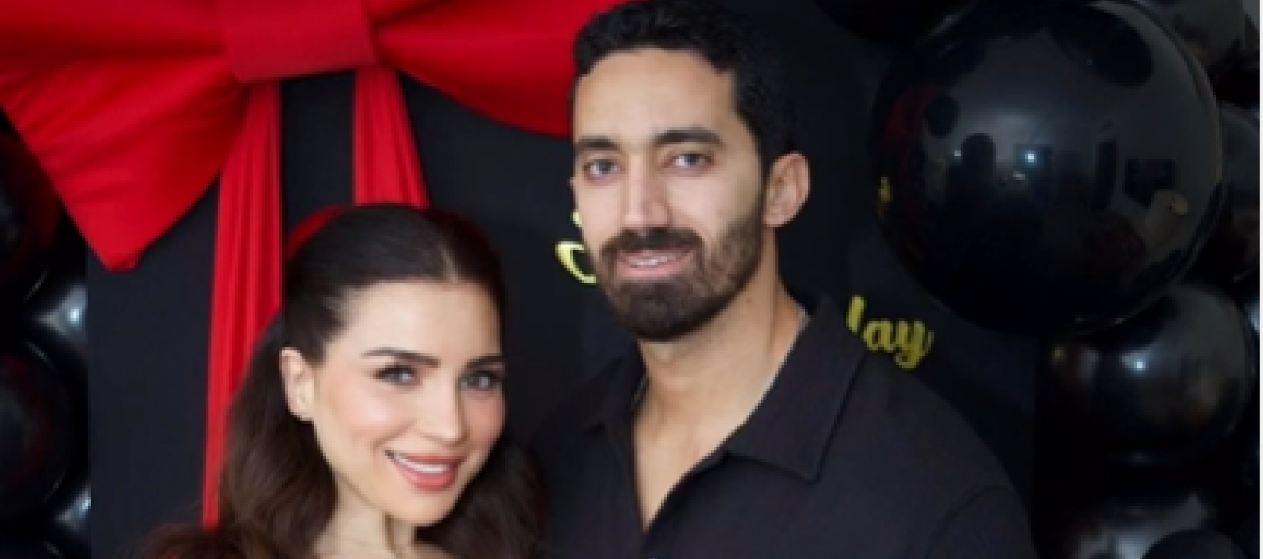 مي عز الدين وزوجها