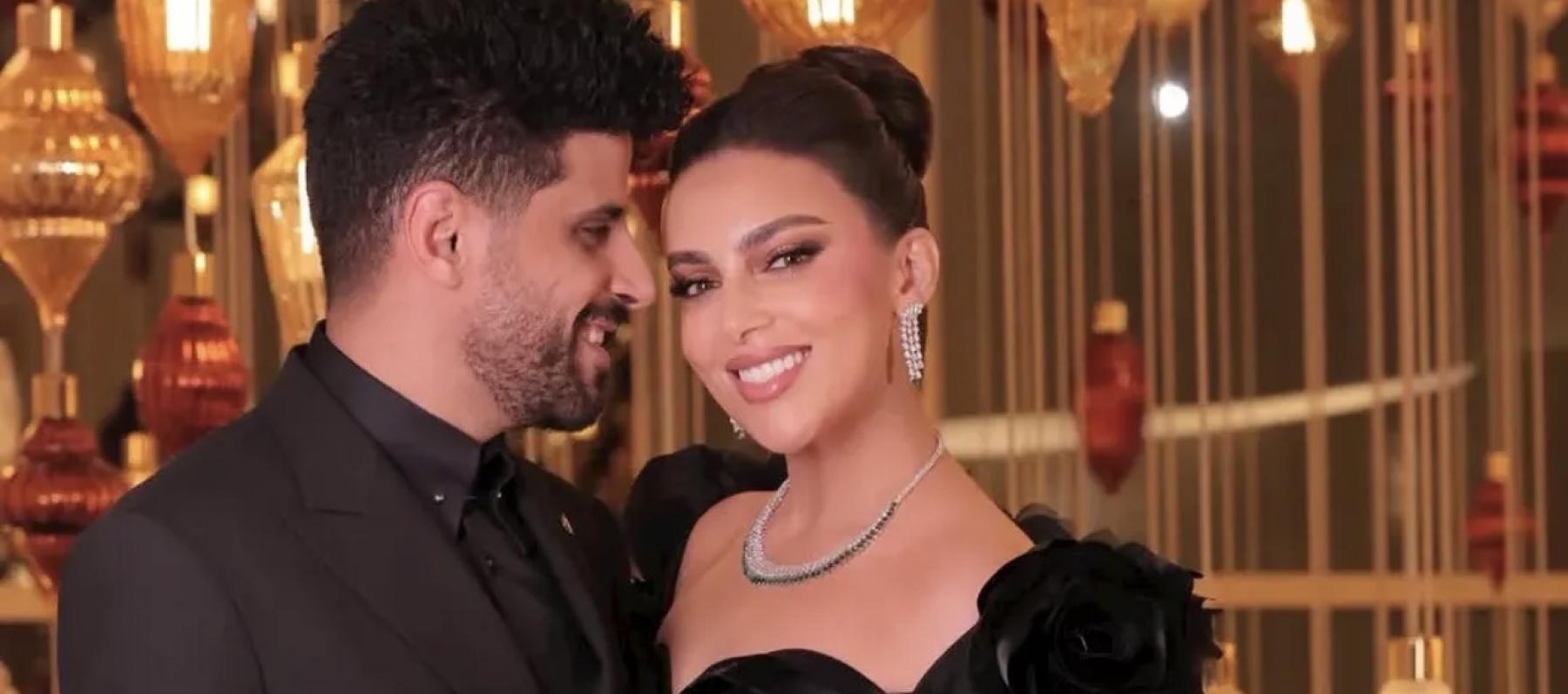 حمدي الميرغني وإسراء عبدالفتاح 