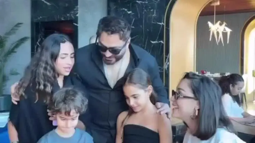 تامر حسني و بسمة بوسيل يحتفلان سويًا بعيد ميلاد ابنتيهما