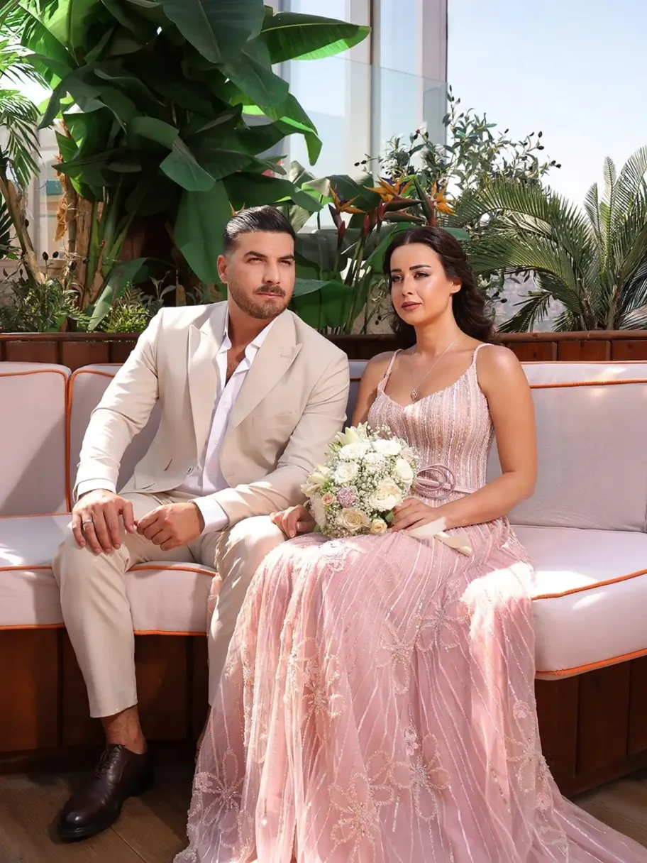 خطوبة حسن خليل وروعة السعدي... إطلالات رومانسية متناغمة  - الصورة بعدسة مهند صادق