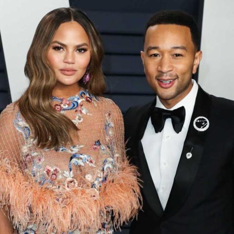 جون ليجند مع زوجته كريسي تايغن