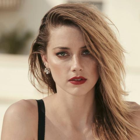 أمبر هيرد تحتفل بإنتصارها على جوني ديب