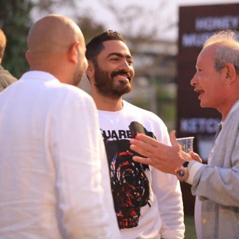 تامر حسني مع نجيب ساويرس من حفل الإفتتاح