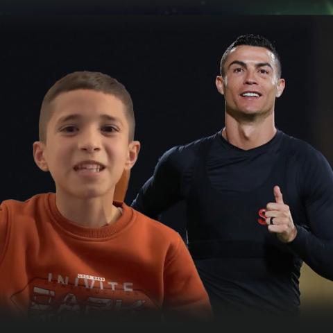 كريستيانو رونالدو والطفل السوري - صورة معدلة