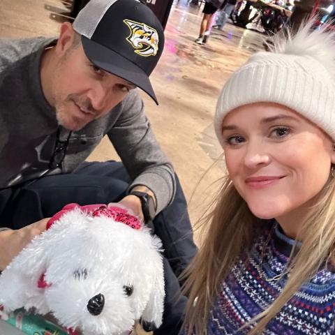 ريز ويذرسبون وزوجها جيم توث