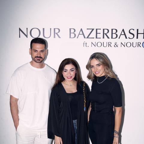 نور الدين اليوسف ونور بازارباشي خلال حفل عرض أزياء لـ NFT