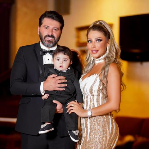 لمى الرهونجي وزوجها يزن السيد وإبنهما آدم