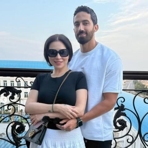 مي عز الدين وزوجها