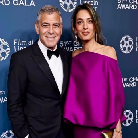 أمل كلوني بفستان بالنسياغا الميكرو الجريء ومجوهرات كارتييه